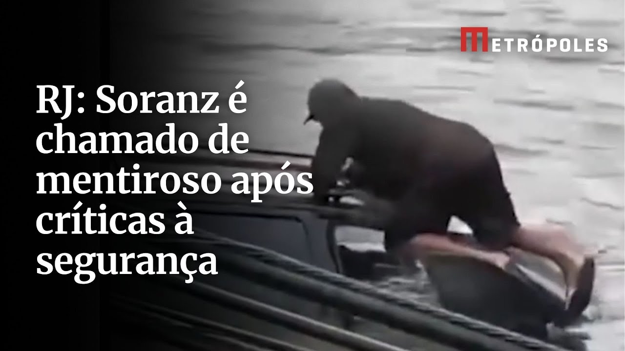 Vídeo homem fica ilhado em teto de carro após temporal e enchente em SP