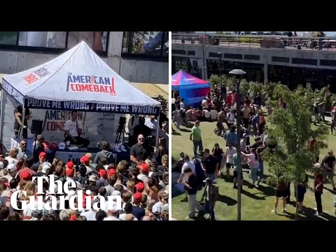 People run for cover after Charlie Kirk shot at university event