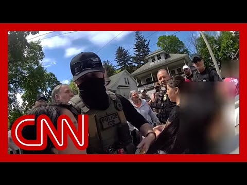 Bodycam video shows residents trying to stop ICE agents from arresting woman