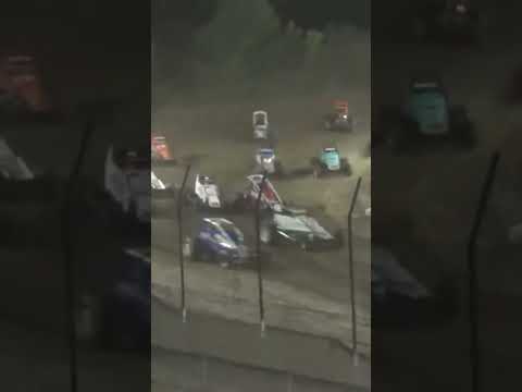 Tristan Furseth (57) flips into the fence during the wingless sprint feature at Wilmot Raceway. - dirt track racing video image