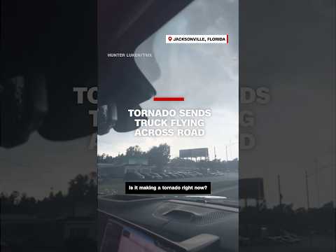 Tornado sends truck flying across road