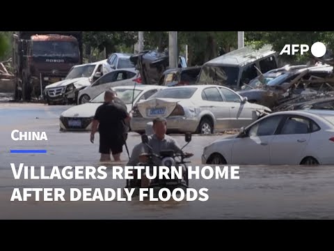 Beijing villagers left with nothing after deadly floods | AFP