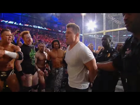 Arrests are made during the chaotic aftermath of the WWE Triple Threat Match: Hell in a Cell 2011 - UCJ5v_MCY6GNUBTO8-D3XoAg