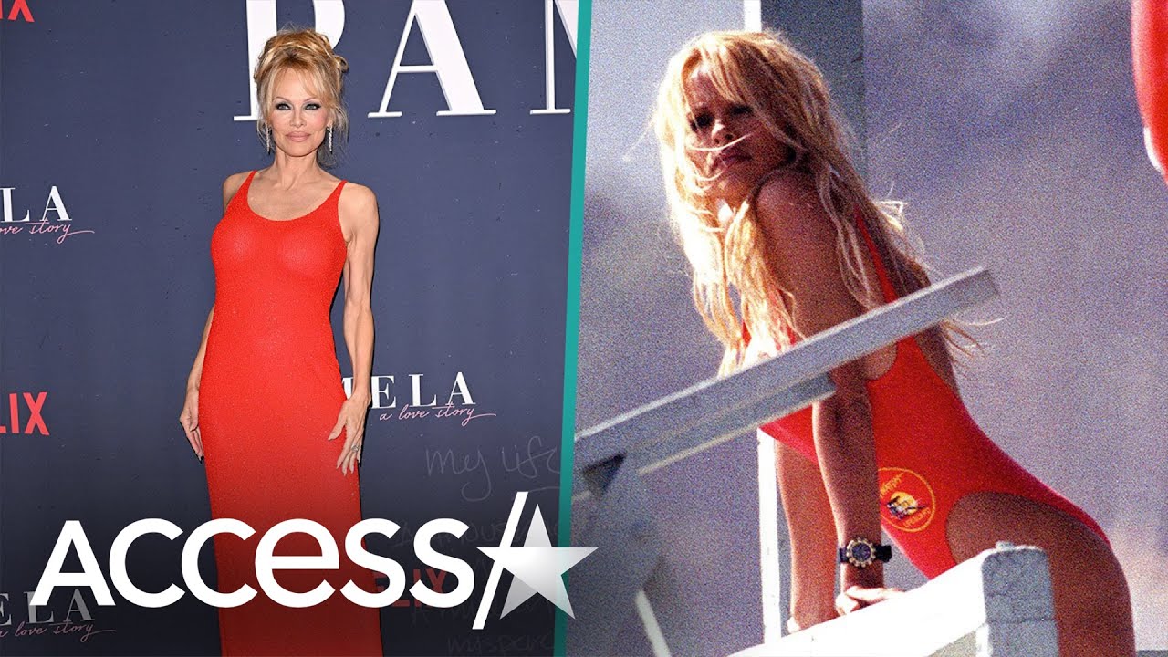 Pamela Anderson Rocks Fiery Red Gown That Reminisces Iconic ‘Baywatch’ Swimsuit At Doc Premiere