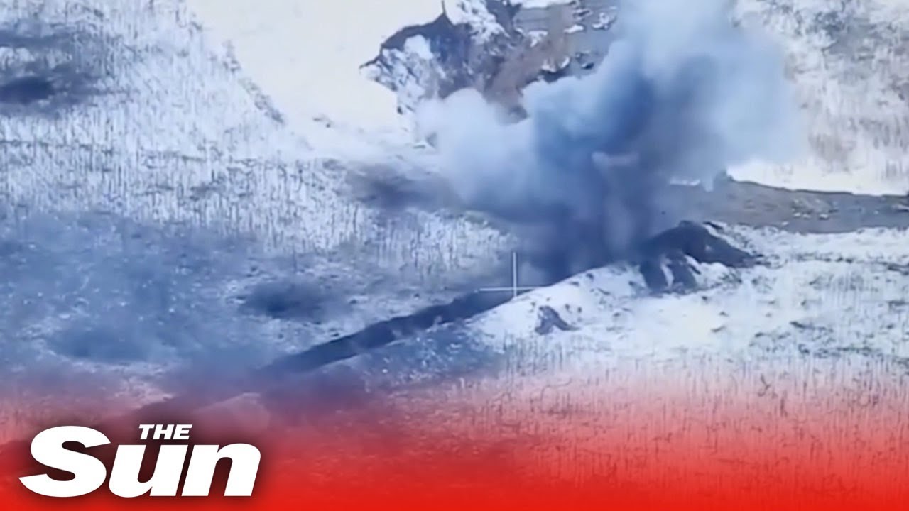 Ukrainian mortars blow up Russian troops hidden in snowy trenches