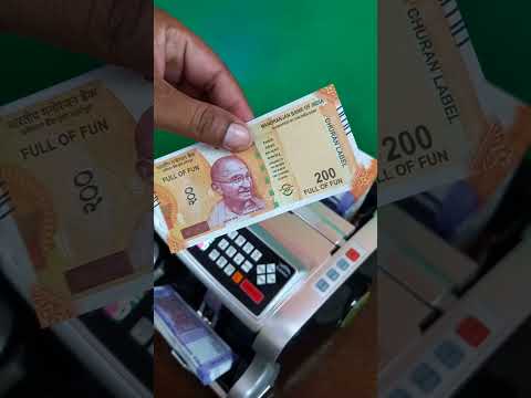 Counting <strong>100</strong> &amp; 200 Churan Label Notes Using Currency Counting Machine 💵 #shorts #<strong>trending</strong> #money #rs