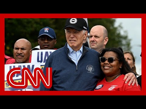 In historic move, Biden joins autoworkers’ picket line