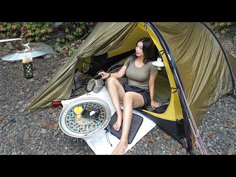 Girl solo camping in a small tent next to a chestnut tree. Hilleberg minimal tent.🍁