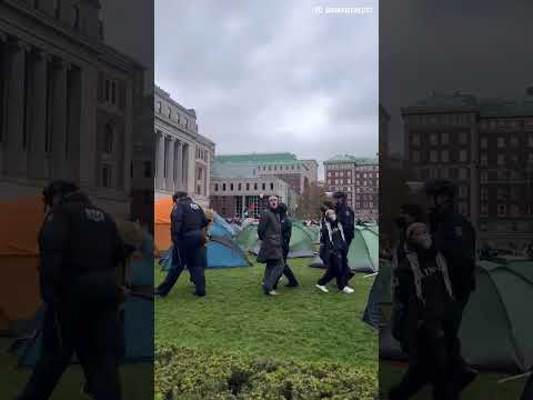 NYPD officers are arresting Pro-Palestine students who refuse to leave
their tents at Columbia