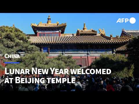 Chinese welcome Lunar New Year visiting Lama temple in Beijing | AFP