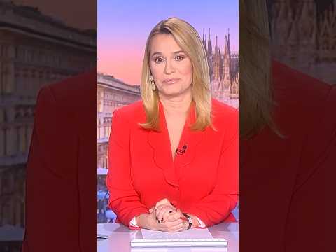 ↑ Cristian Chivu a purtat torţa olimpică la Milano