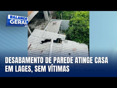 Parede de prédio em construção desaba e cai em casa no centro de Lages