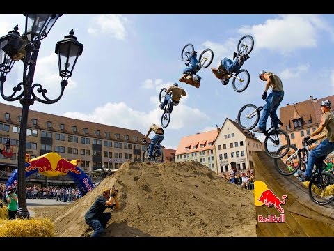 Big Air Slopestyle MTB in Slow Motion - Red Bull District Ride - UCXqlds5f7B2OOs9vQuevl4A