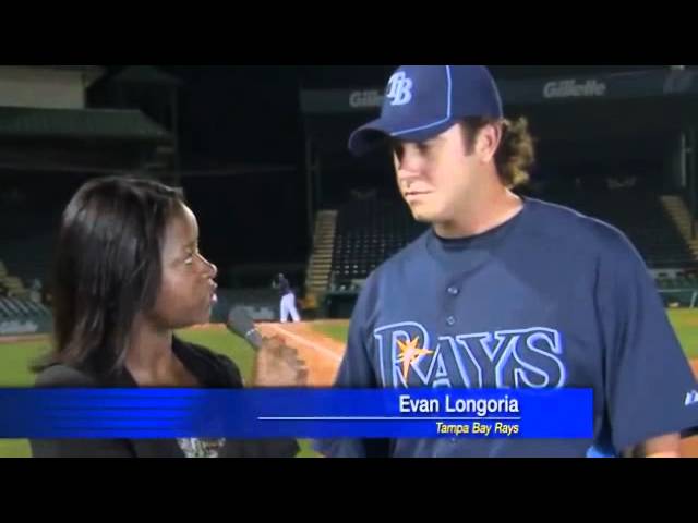 Baseball Player Catches Ball During Interview