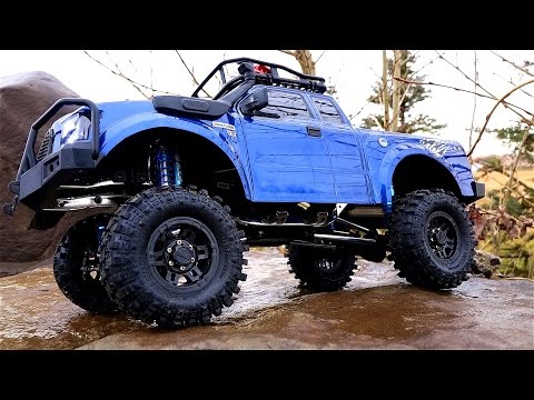 RC ADVENTURES - FORD GMade Komodo 4x4 Truck w/100mm KiNG Shocks - Rock Trailing on Slippery Rocks - UCxcjVHL-2o3D6Q9esu05a1Q