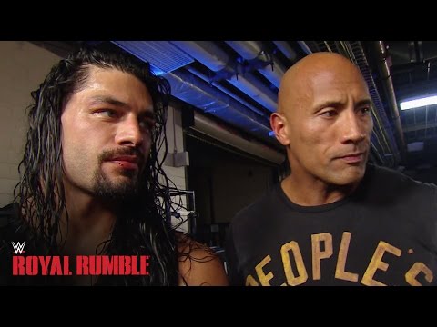 Roman Reigns celebrates with The Rock after winning the Royal Rumble Match - WWE Network - UCJ5v_MCY6GNUBTO8-D3XoAg