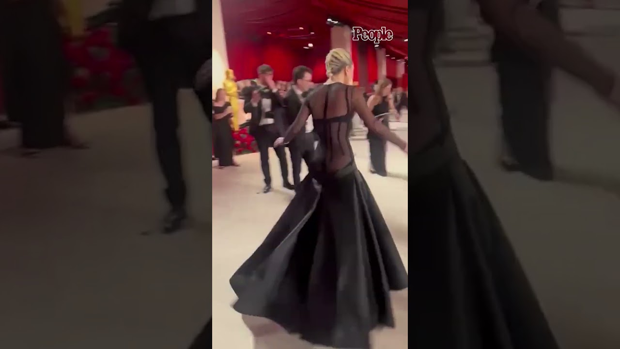Lady Gaga Helps a Photographer After He Falls on the Oscars Carpet #Shorts #Oscars