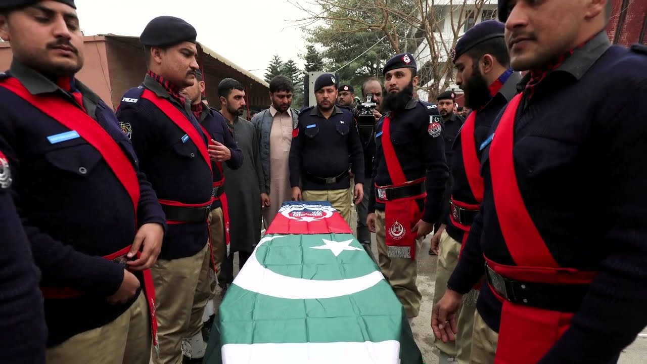 Pakistan says mosque bomber wore police uniform
