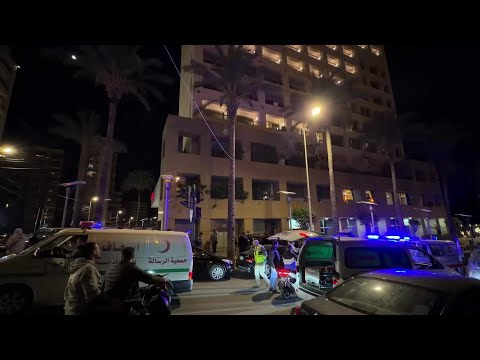 Shattered windows at Beirut hotel hit by Israeli strike | AFP
