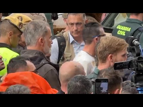 Spain's King heckled on visit to flood-hit area | AFP