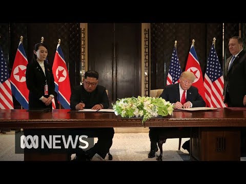 Donald Trump and Kim Jong-un sign document after summit - UCVgO39Bk5sMo66-6o6Spn6Q