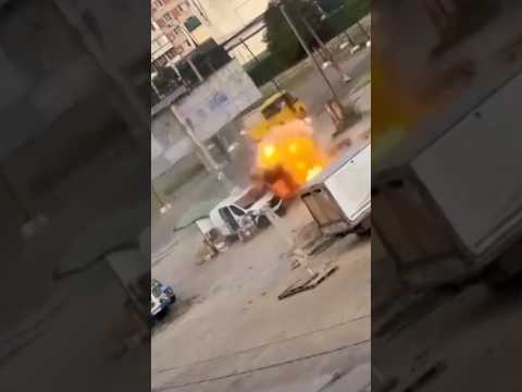 Video shows drone chasing man round van before exploding