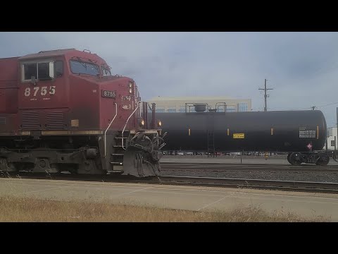 Union Pacific 5409 leads a manifest meets a Canadian Pacific 8755 leading a grain in Roseville, CA