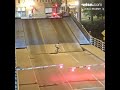 shows bicyclist falling into Wisconsin draw bridge