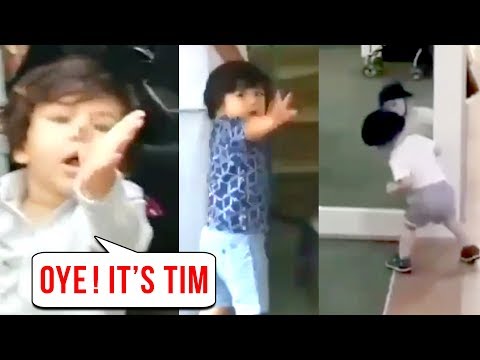 WATCH #Bollywood #Cute TAIMUR Ali Khan PLAYS With His MIRRORReflection, Says TIM , Greets Media With Cute Smile #India #Special #Kids