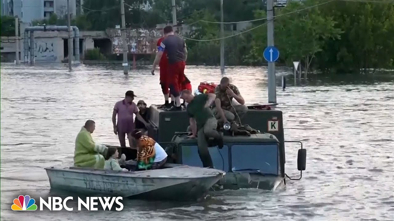 Watch: Kherson residents seek safety on military trucks after dam breach flooding