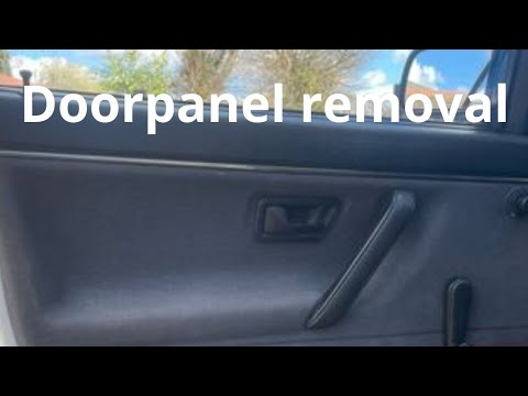Come rimuovere il pannello della portiera sulla VW Golf 2
