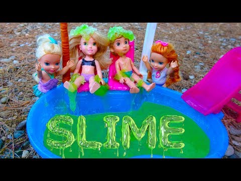 Elsa and Anna toddlers slime in the pool - UCB5mq0ucfGe9dNCIC0s41QQ