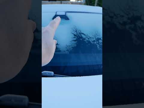 Tesla Model Y has heated front cameras which are visible when defrosting a frozen car