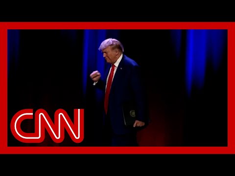 Trump walks onto rally stage as song lyric 'going to prison' plays