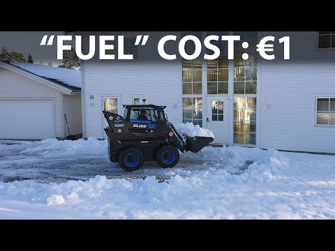 Clearing snow with Elise 700 electric skid-steer