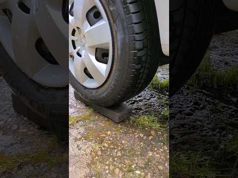 What nutter washes their vehicle on blocks?