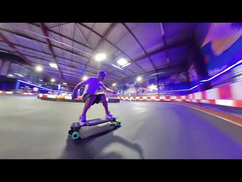ELECTRIC SKATEBOARDING AT SPEED IN A KART RACING TRACK