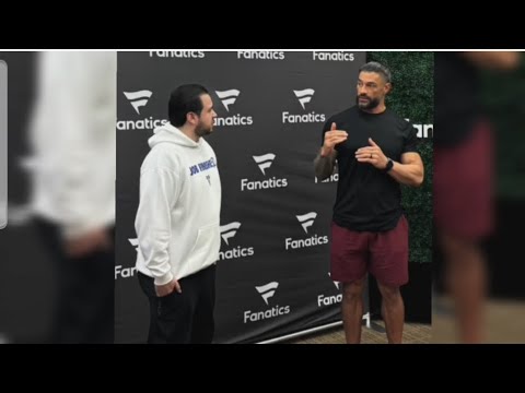 Roman Reigns having a good time with fans backstage off air at Fanatics - WWE RAW & SMACKDOWN