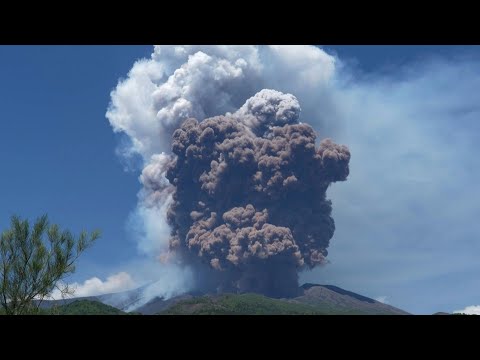 Smoke rising from Italy's Etna volcano as it erupts | AFP