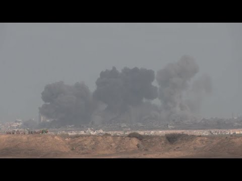 Columns of smoke rise from the Gaza Strip seen from south Israel | AFP