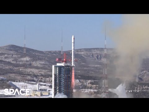 China's Long March 2D launches 14 satellites, rocket sheds tiles