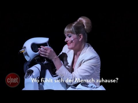 Crave - Singing robot stars in new opera production, Ep. 209 - UCOmcA3f_RrH6b9NmcNa4tdg