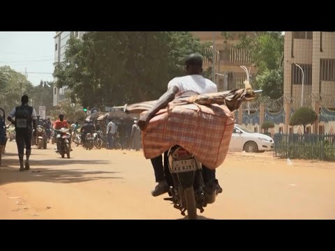 People leave central Ouagadougou and shutter shops after Burkina coup | AFP