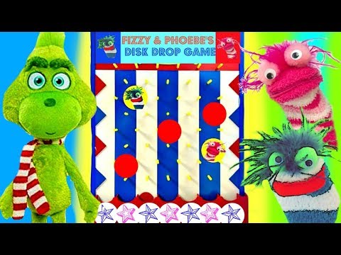 The Grinch Movie Plays Fizzy and Phoebe's Disk Drop Game for Toy Surprises - UCV6P5rRVmiTL637byUZBTrQ