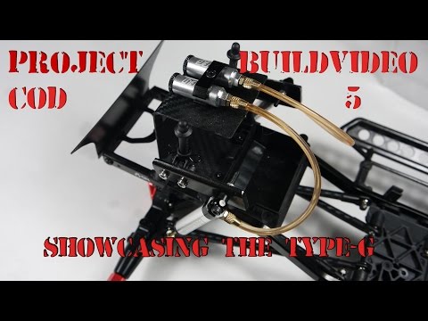 COD buildvideo 5 showcasing Type-g shocks. A  custombuild Axial - UCl1-Zn3aJCnBYZcPKzbsGtA