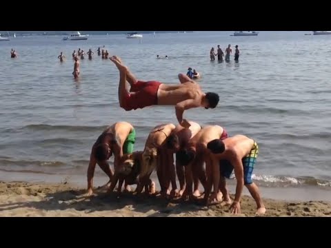 People are Awesome: Frontflip over 6 people at the beach! - UCIJ0lLcABPdYGp7pRMGccAQ