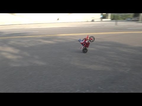 Super Rider SR4 RC Dirt Bike -- Pulling Wheelies - UCsFctXdFnbeoKpLefdEloEQ