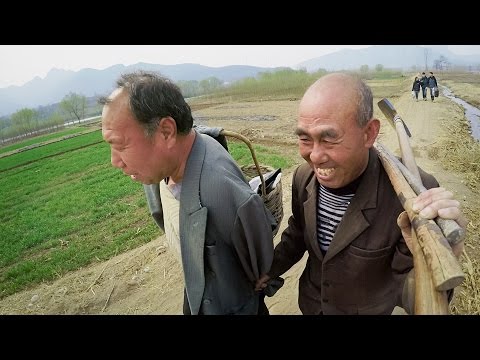 GoPro: A Blind Man and His Armless Friend Plant a Forest in China - UCqhnX4jA0A5paNd1v-zEysw