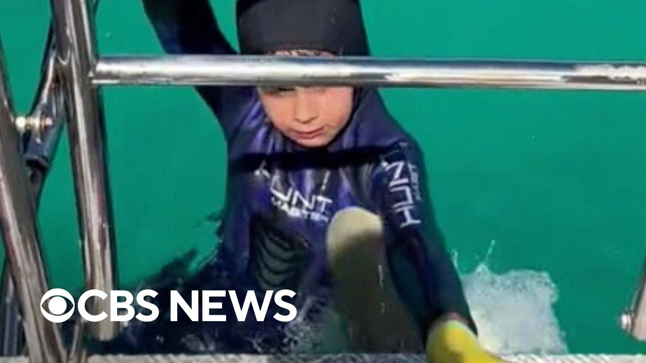 Video shows shark biting 8-year-old boy during family fishing trip