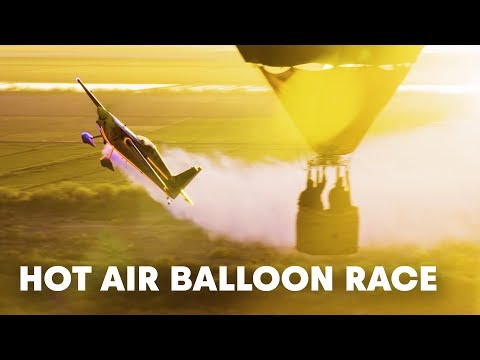 An unexpected aerobatics session through hot air balloons w/ Kirby Chambliss. - UCblfuW_4rakIf2h6aqANefA